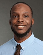 Dr. Justice C. Ezeani, D.C. - Professional headshot