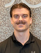 Dr. Cody Holop, D.C. - Professional headshot