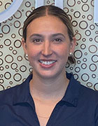 Dr. Courtney Woollen, D.C. - Professional headshot