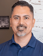 Dr. Angel Rivas, D.C. - Professional headshot