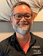 Dr. Votka Sbong, D.C. - Professional headshot