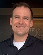 Dr. Justin Schexnaildre,  D.C. - Professional headshot