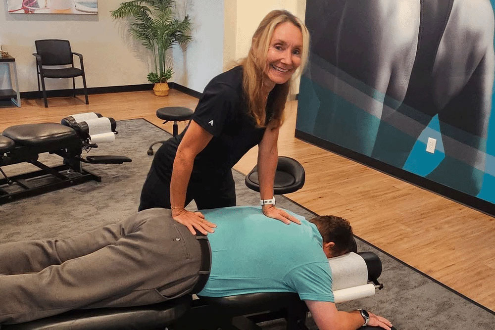 The Joint Chiropractic Delray Beach Patient Adjustment