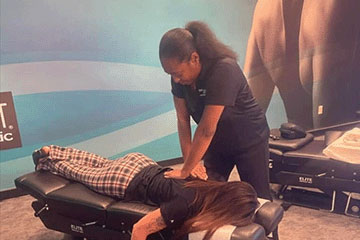 The Joint Chiropractic Palm Bay Patient Adjustment