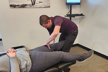 The Joint Chiropractic Greenlawn Patient Adjustment