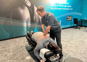 The Joint Chiropractic Oxnard Patient Adjustment