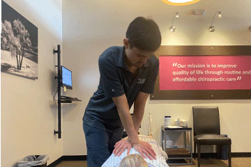The Joint Chiropractic Greenlawn Patient Adjustment