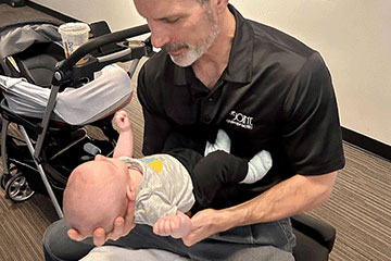 The Joint Chiropractic Northwoods Patient Adjustment