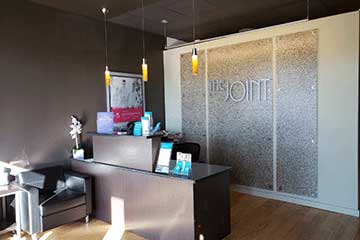 The Joint Chiropractic Sunset Galleria Front Desk