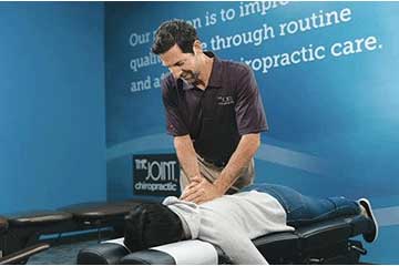 The Joint Chiropractic Glen Ellyn Patient Adjustment