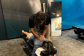 The Joint Chiropractic Bellevue Patient Adjustment