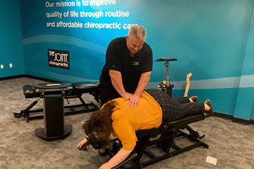The Joint Chiropractic Overland Park Patient Adjustment
