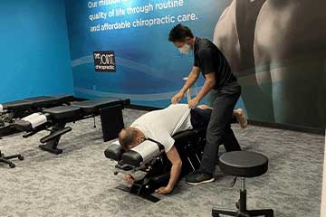 The Joint Chiropractic Thousand Oaks CA Patient Adjustment