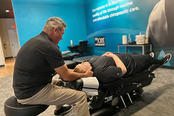 The Joint Chiropractic Port Hueneme Patient Adjustment