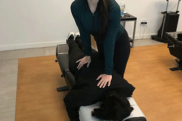 The Joint Chiropractic Downers Grove Patient Adjustment