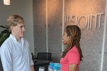 Chiropractor and patient at The Joint Chiropractic Bellevue