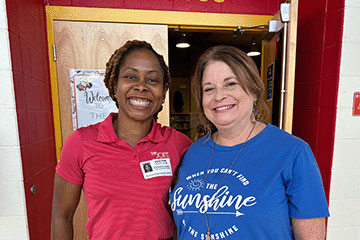 The Joint Chiropractic Clarksville Staff and Patient