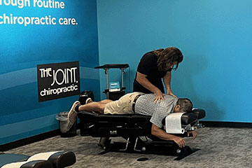 The Joint Chiropractic Bellevue Patient Adjustment