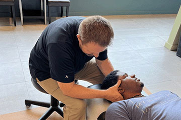 The Joint Chiropractic Downers Grove Patient Adjustment 
