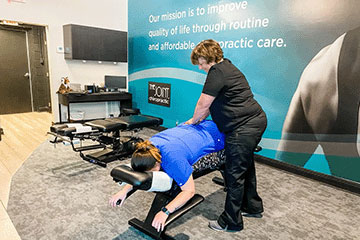 The Joint Chiropractic Monroe Patient Adjustment 