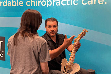 The Joint Chiropractic Round Rock Doctor and Patient