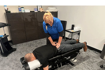 The Joint Chiropractic Kingwood Patient Adjustment