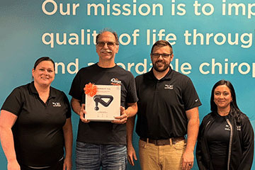 The Joint Chiropractic Wichita SW Staff and Patient