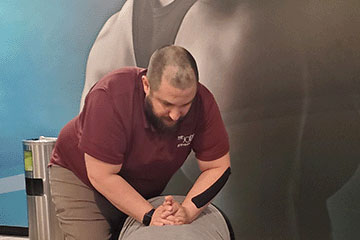 The Joint Chiropractic Kitty Hawk Patient Adjustment