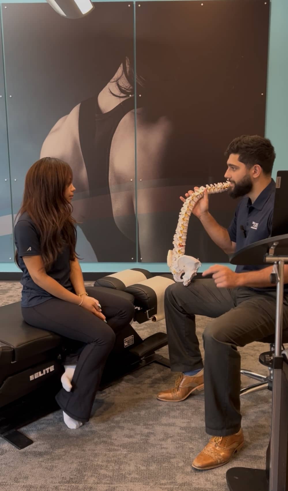 Chiropractors in New Rochelle meet with patients about pain relief and treatment.