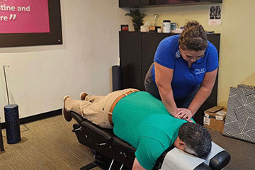 The Joint Chiropractic Greenlawn Patient Adjustment