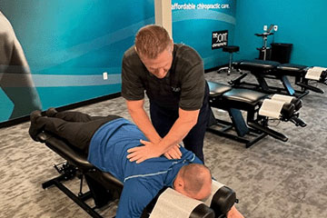 The Joint Chiropractic Shawnee Patient Adjustment