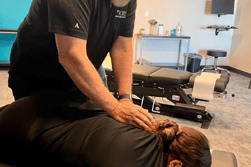 The Joint Chiropractic Caldwell Patient Adjustment
