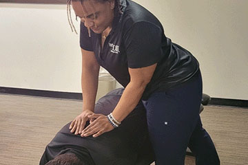 The Joint Chiropractic Heights Patient Adjustment