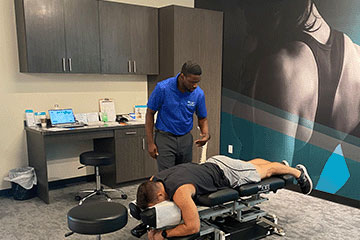 The Joint Chiropractic Stuart Patient Adjustment