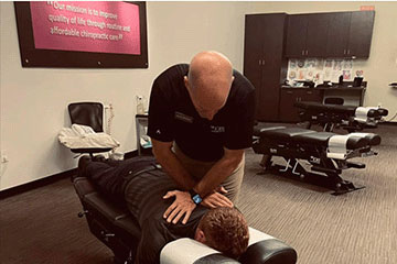 The Joint Chiropractic Palm Bay Patient Adjustment