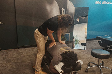 The Joint Chiropractic Bellevue Patient Adjustment