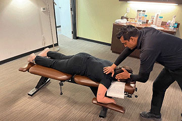 The Joint Chiropractic Orange Town and Country Patient Adjustment