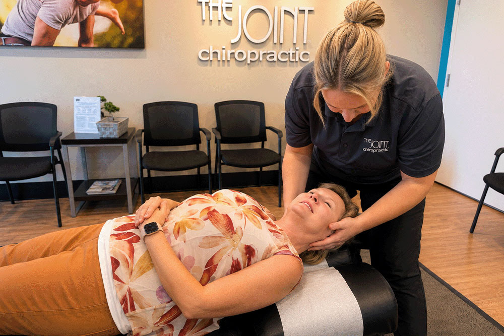 The Joint Chiropractic Gainesville Archer Road Patient Adjustment
