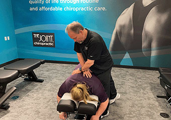 The Joint Chiropractic Port Hueneme Patient Adjustment