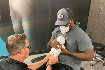 The Joint Chiropractic Kitty Hawk Patient Adjustment