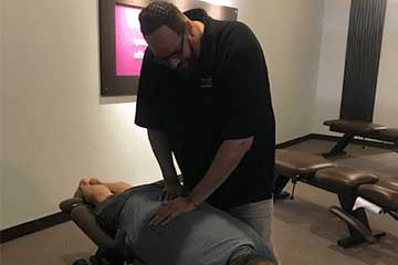 The Joint Chiropractic Desert Ridge Patient Adjustment