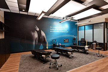 The Joint Chiropractic Grant & Swan Adjustment Bay