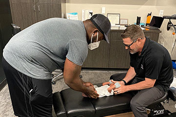 The Joint Chiropractic Kitty Hawk Patient Adjustment