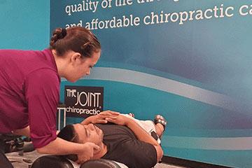 The Joint Chiropractic Kitty Hawk Patient Adjustment