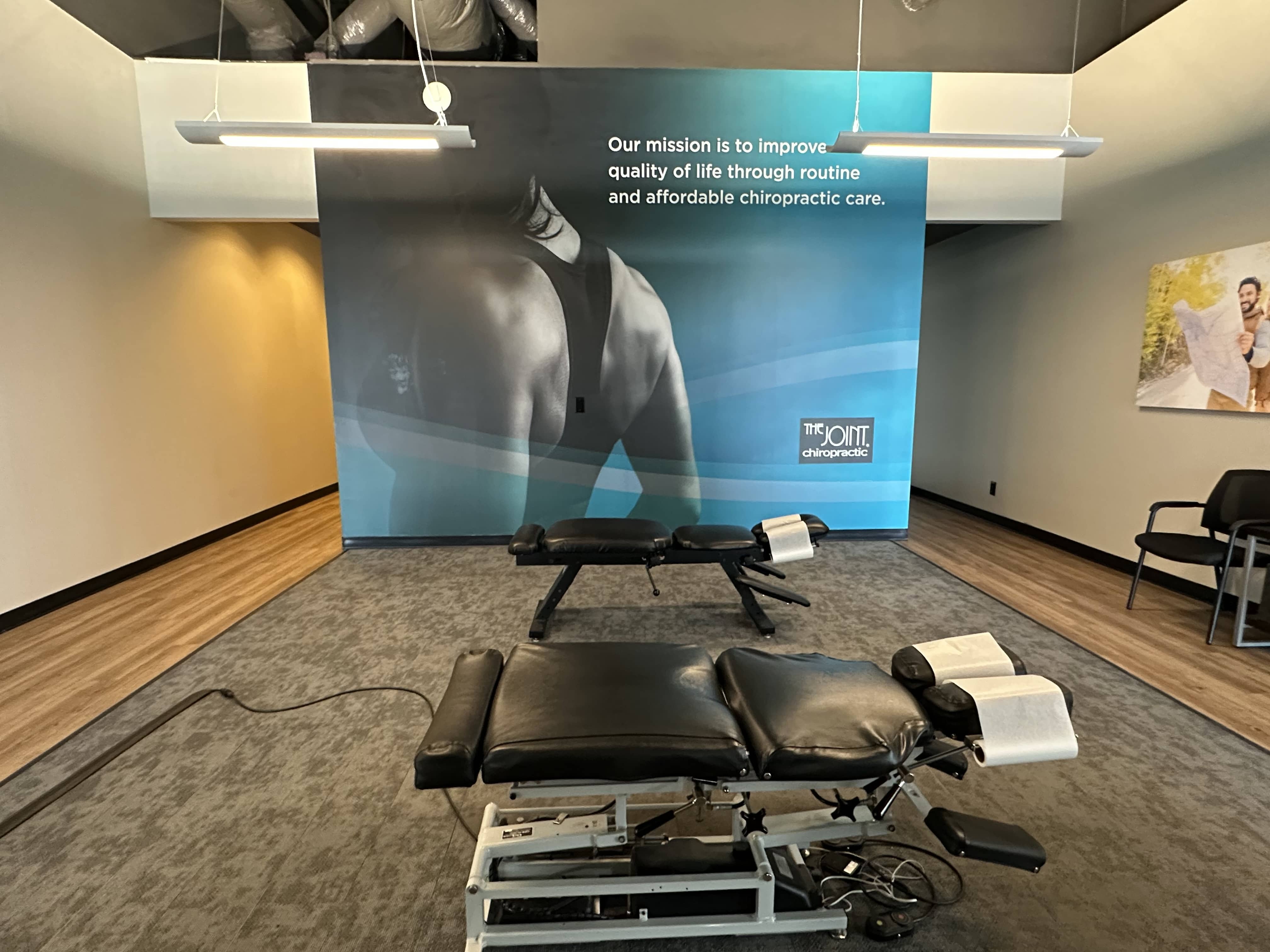 Chiropractic adjustments for back pain, neck pain, stiffness, and more at The Joint Chiropractic - B