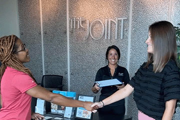 Staff and patients at The Joint Chiropractic Bellevue