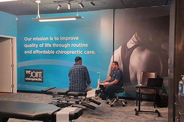 The Joint Chiropractic Round Rock  Doctor and Patient