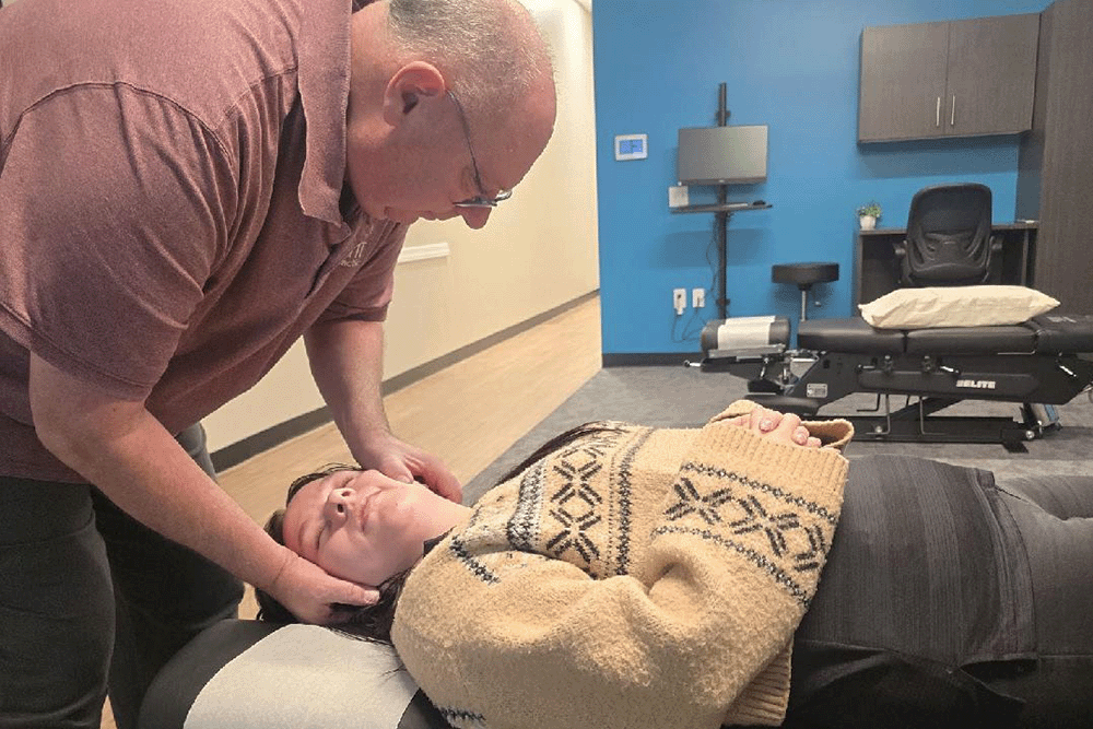 The Joint Chiropractic Verrado Patient Adjustment