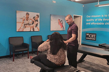The Joint Chiropractic Round Rock  Patient Adjustment