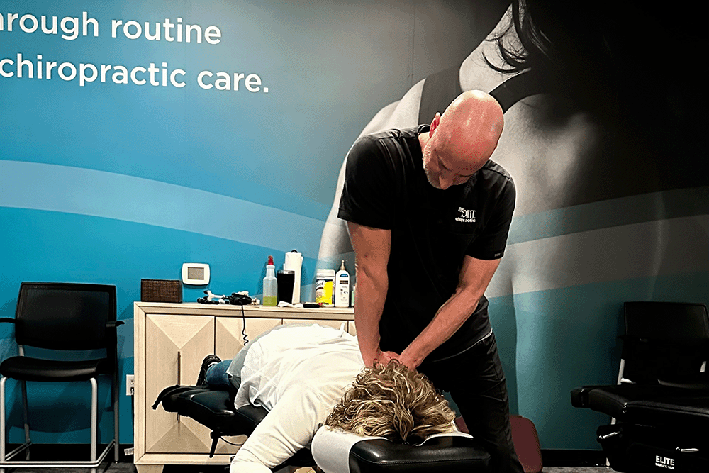 The Joint Chiropractic Sandy Patient Adjustment
